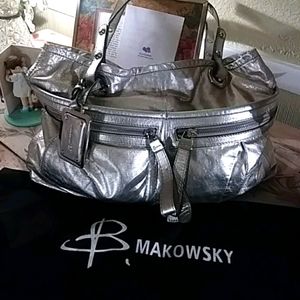 Silver metalic/supple leather bag.